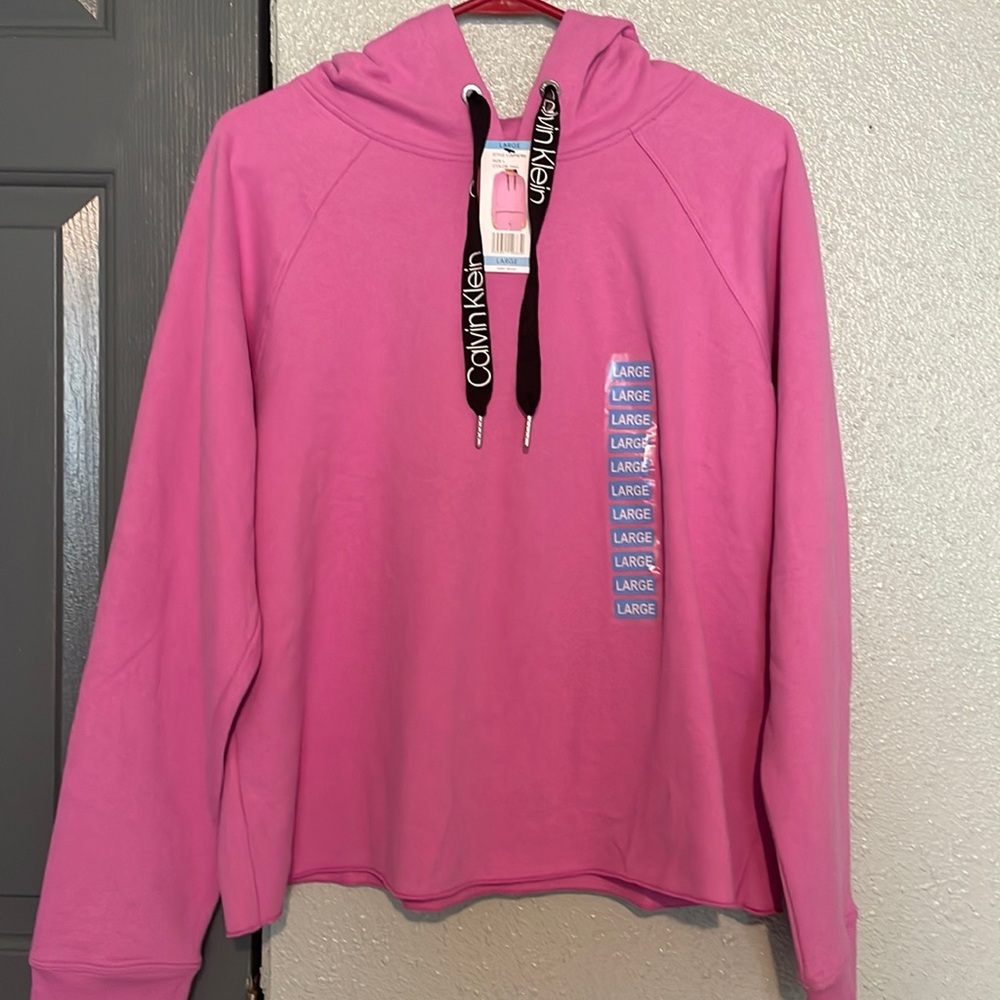pink calvin klein sweatshirt fits as small